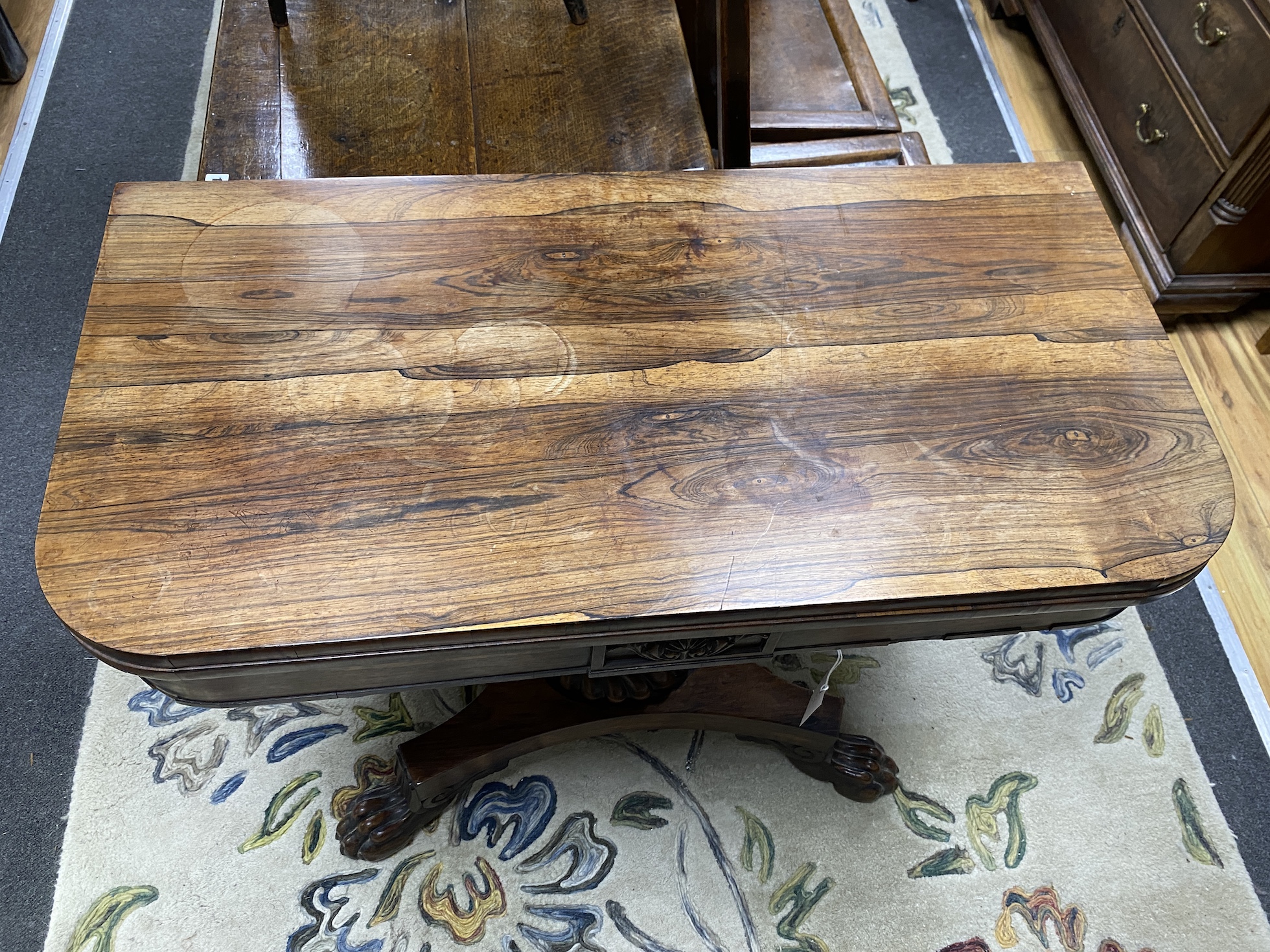 A William IV rosewood folding card table, width 92cm, depth 45cm, height 73cm